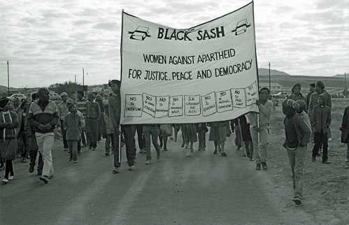 Youth marching while carrying a Black Sash banner, 1985 AL3274_C45