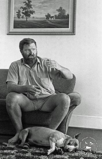 This black and white photograph of Paul van der Merwe in Braklaagte was taken by Gille de Vlieg in 1989. 