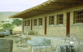 This colour photograph of the construction of a school building in Mogopa was taken by Gille de Vlieg in February 1984. Included in SAHA Land Act Project report, 2014.