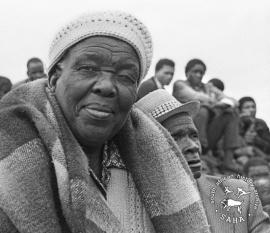 This black and white photograph of Maria Sebogodi at a meeting in Braklaagte to show resistance to incorporation into Bophuthatswana was taken by Gille de Vlieg on 4 February 1989. Included in SAHA Land Act Project report, 2014.
