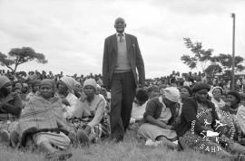 This black and white photograph of Chief John Sebogodi walking through a crowd of residents at a meeting in Braklaagte to show resistance to incorporation into Bophuthatswana was taken by Gille de Vlieg on 4 February 1989. Included in SAHA Land Act Project report, 2014.