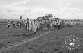 This black and white photograph of priests leading the procession at the funeral of Themba Dlamini in Driefontein was taken by Gille de Vlieg in May 1990. Included in SAHA Land Act Project report, 2014.