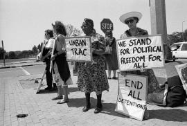 This is a black and white image of Black sash members in Mmabatho protesting. This image is also used in the Land Act Virtual exhibition