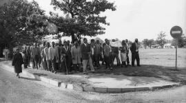 This is a black and white image of Driefontein people marching to court. Used in the Land act virtual exhibition