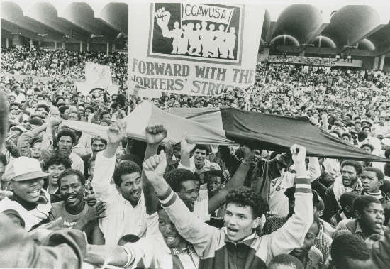 Workers at COSATU rally in the Western Cape, 1986 Workers at COSATU rally in the Western Cape. 1986. Original SAHA Collection, AL2547_11.11.5 (Photographer unknown/Source:IDAF)