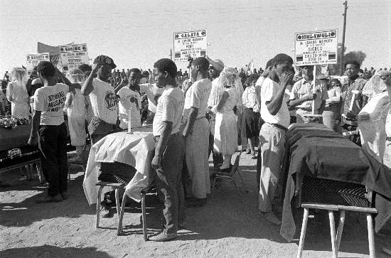 The funeral of the Cradock Four included guards of honour for Matthew Goniwe, Sicelo Mhlauli, Sparrow Mkhonto, Fort Calata, 19 July, 1985, Gille de Vlieg Collection, AL3274_C29.6 The funeral of the Cradock Four included guards of honour for Matthew Goniwe, Sicelo Mhlauli, Sparrow Mkhonto, Fort Calata, 19 July, 1985, Gille de Vlieg Collection, AL3274_C29.6