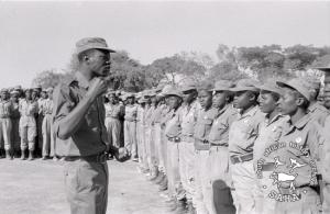 Chief of Staff Ambrose Mutinhiri and Women's Brigade at the parade