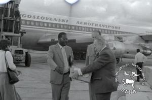 Yugoslavia delegates with reception goods