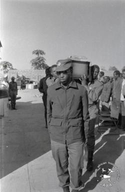 Pall bearers carrying the coffin of Nikita Mangena