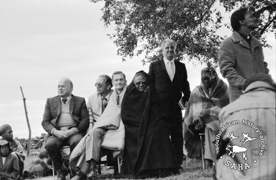 Priests at a night vigil, including Bishop Tutu, prior to the announced removal of Mogopa (1983). Archived in SAHA Collection AL3274 :: The Gille de Vlieg Photographic Collection