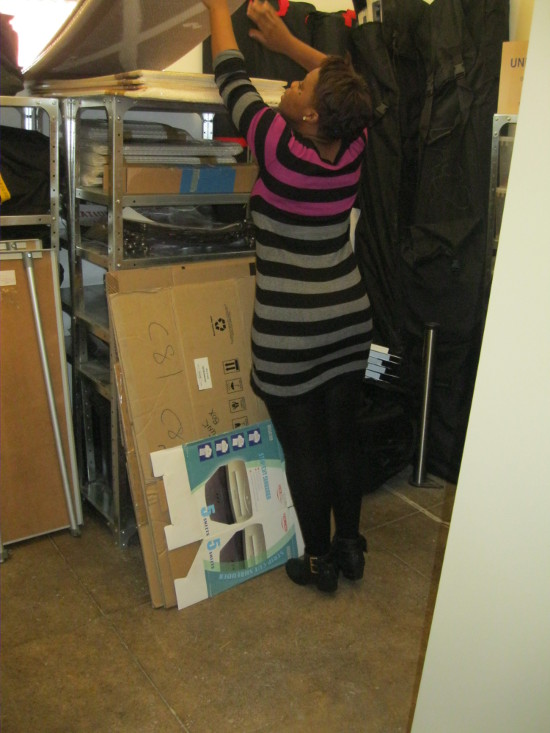 Archival assistant Nonhlanhla Ngwenya organising exhibition materials in the new storeroom, 2014