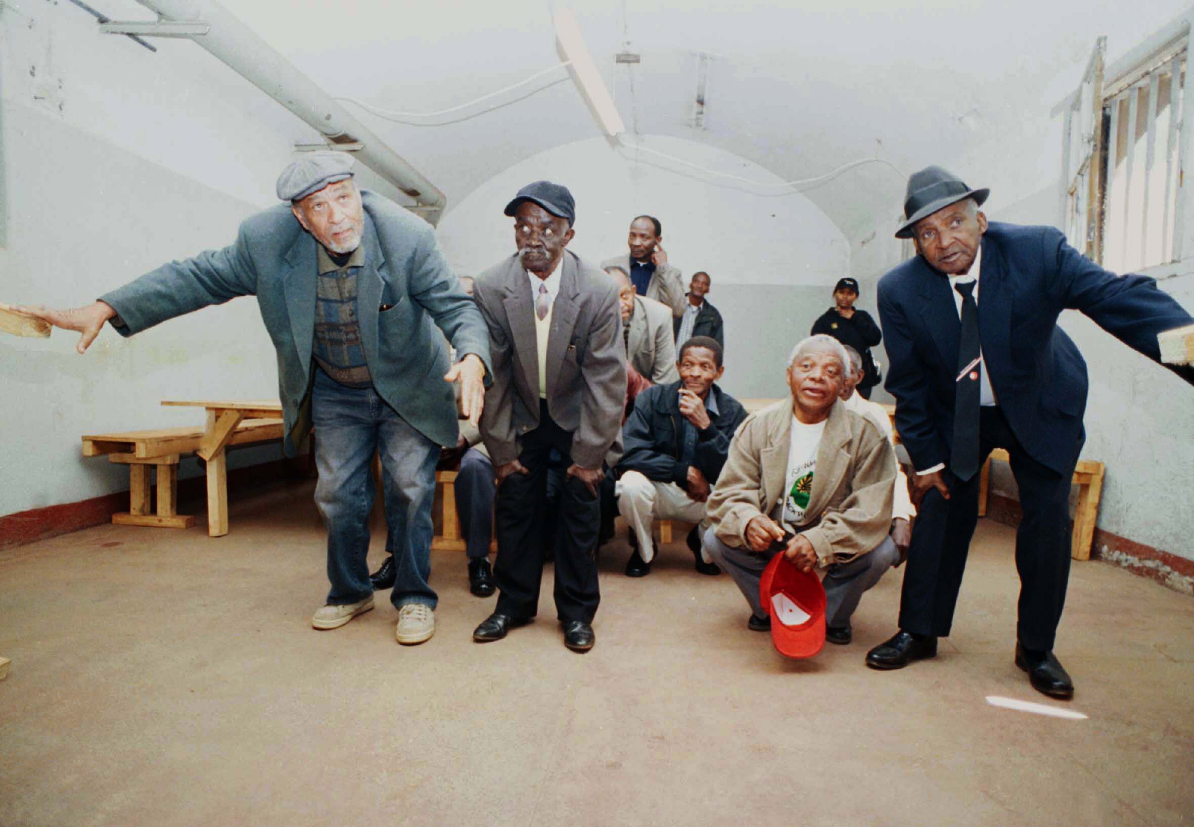 Ex-prisoners of the Number Four prison, and members of the PAC during the 1960's, at the PAC Ex-Political Prisoners Workshop held at The Old Fort, Johannesburg, 23 August 2003. The workshop was facilitated by Heritage, Education and Tourism team members Lauren Segal and Joy Pelo during the planning and implementation of Constitution Hill heritage programmes and exhibitions. Constitution Hill Trust Collection. Photograph by Oscar Gutierres. 